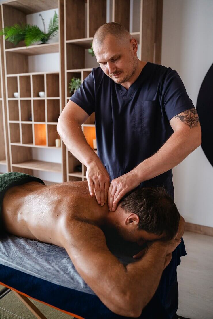 Red Coral Spa in Dombivli and Thane high-angle-man-massage