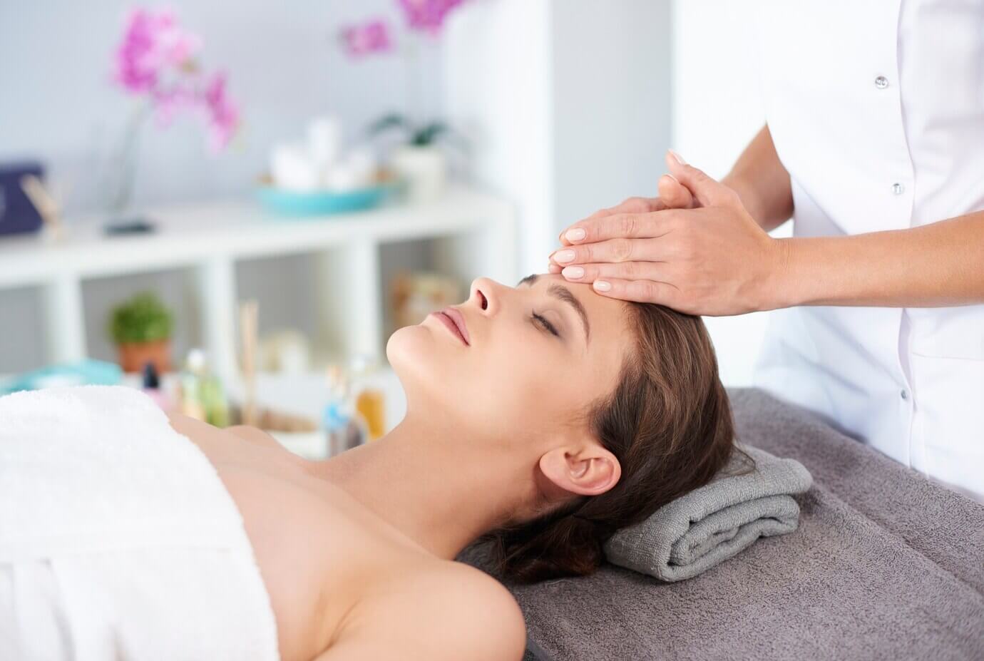young-female-receiving-professional-headmassage